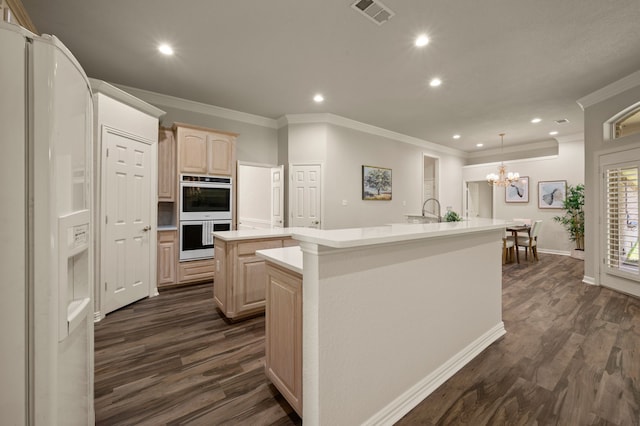 324 Lakeside Oaks Cir, Lakeside, TX 76135 - kitchen featuring a kitchen island with sink, white fridge with ice dispenser, stainless steel double oven, dark wood finished floors, and a chandelier