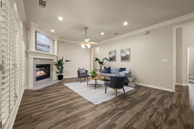 324 Lakeside Oaks Cir, Lakeside, TX 76135 - living room featuring recessed lighting, dark wood-style flooring, a fireplace, baseboards, and ornamental molding