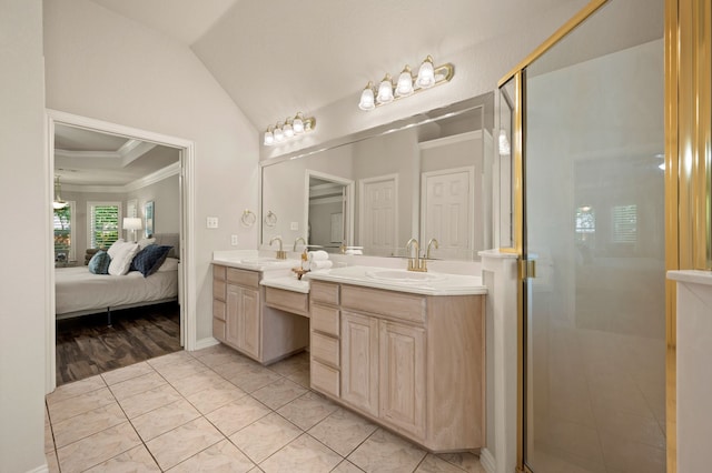 324 Lakeside Oaks Cir, Lakeside, TX 76135 - bathroom with double vanity, ornamental molding, a stall shower, ensuite bath, and vaulted ceiling