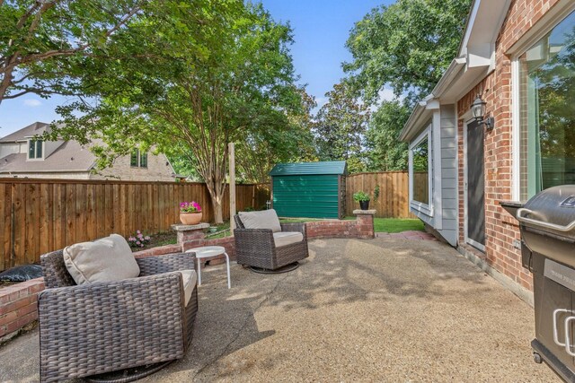 4206 Creekbluff Dr, Rowlett, TX 75088 - fenced backyard featuring a patio area and grilling area