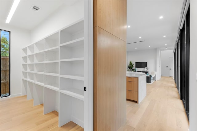 5029 Pershing St, Dallas, TX 75206 - hall featuring light wood-style floors and recessed lighting
