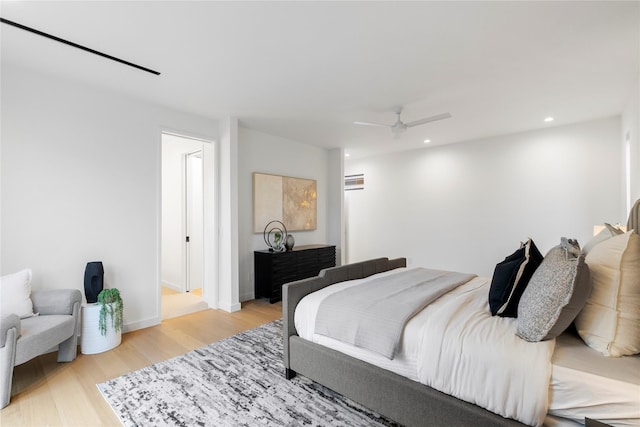 5029 Pershing St, Dallas, TX 75206 - bedroom with light wood finished floors, ceiling fan, baseboards, and recessed lighting