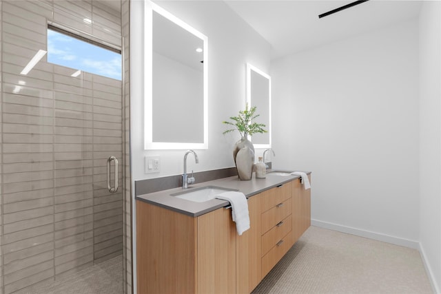5029 Pershing St, Dallas, TX 75206 - bathroom with double vanity, a shower stall, and baseboards
