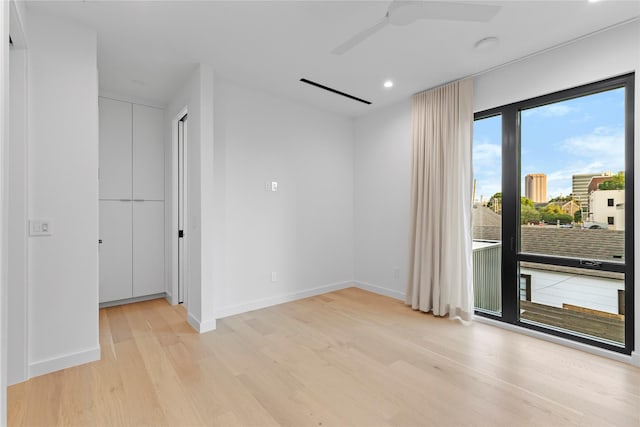 5029 Pershing St, Dallas, TX 75206 - unfurnished room featuring light wood-style floors, a ceiling fan, baseboards, and recessed lighting