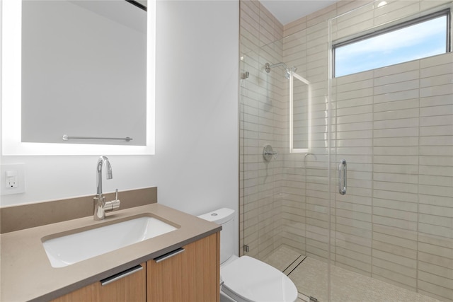 5029 Pershing St, Dallas, TX 75206 - bathroom featuring toilet, vanity, and a shower stall