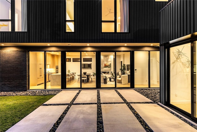5029 Pershing St, Dallas, TX 75206 - view of exterior entry featuring brick siding
