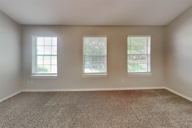 1701 Shiprock Dr, Plano, TX 75025 - carpeted empty room featuring baseboards