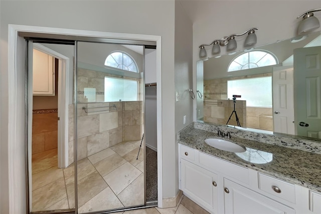 1701 Shiprock Dr, Plano, TX 75025 - bathroom with vanity and a tile shower
