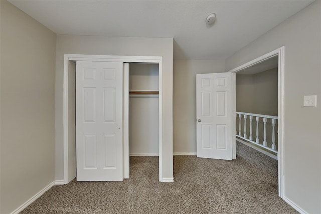 1701 Shiprock Dr, Plano, TX 75025 - unfurnished bedroom featuring carpet flooring, a closet, and baseboards