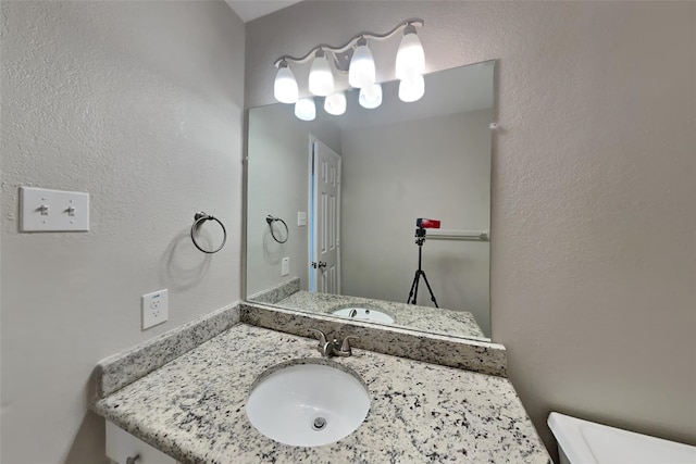 1701 Shiprock Dr, Plano, TX 75025 - half bathroom with vanity and toilet
