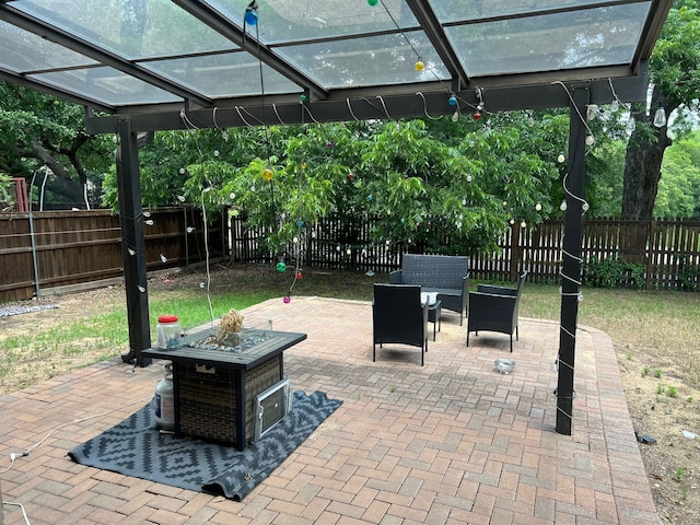 1701 Shiprock Dr, Plano, TX 75025 - fenced backyard featuring a patio area, a fire pit, and outdoor dining area