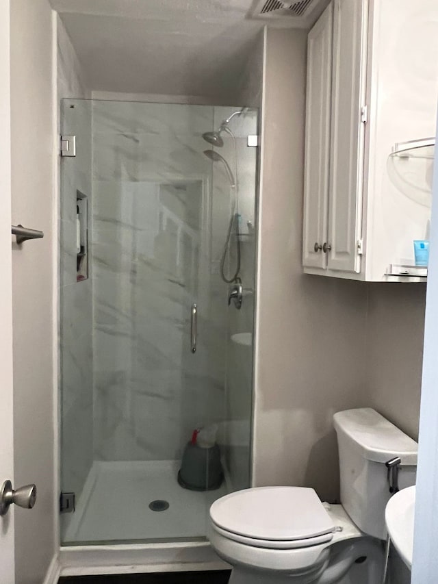 1701 Shiprock Dr, Plano, TX 75025 - bathroom featuring toilet and a stall shower