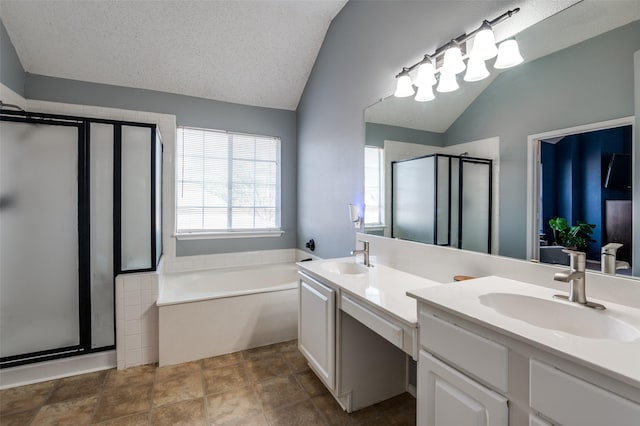 623 Stretford Ln, Allen, TX 75002 - bathroom with lofted ceiling, a stall shower, double vanity, and a bath
