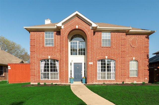 623 Stretford Ln, Allen, TX 75002 - view of front facade featuring brick siding, a chimney, and a front lawn