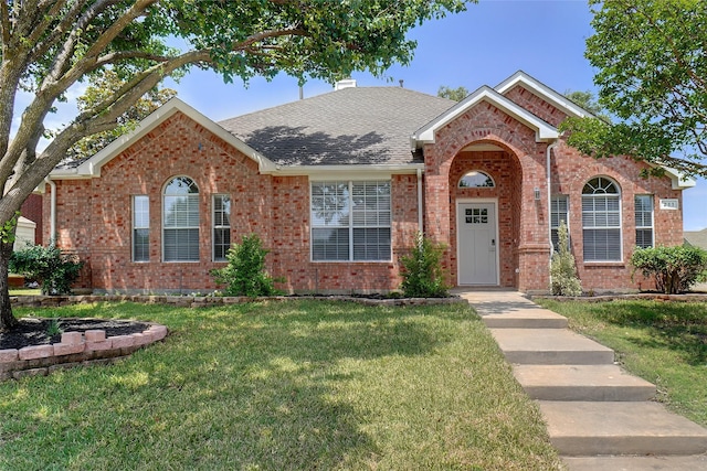 211 Windsong Way, Allen, TX 75002 - view of front of property with brick siding, a front lawn, and roof with shingles