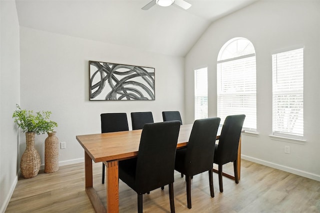 211 Windsong Way, Allen, TX 75002 - dining room featuring healthy amount of natural light, lofted ceiling, light wood-type flooring, and baseboards