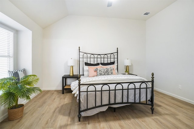 211 Windsong Way, Allen, TX 75002 - bedroom featuring light wood-style flooring, baseboards, vaulted ceiling, and ceiling fan