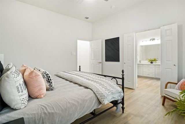 211 Windsong Way, Allen, TX 75002 - bedroom featuring light wood finished floors and ensuite bathroom