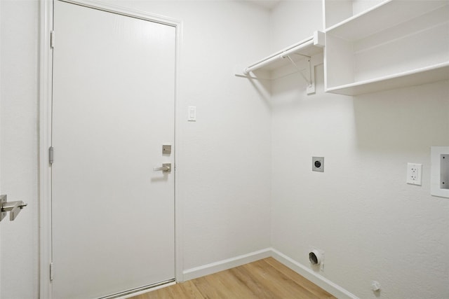 211 Windsong Way, Allen, TX 75002 - laundry room featuring electric dryer hookup, light wood-style floors, and baseboards