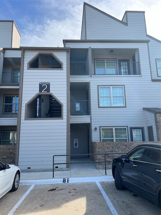 6108 Abrams Rd Unit 225, Dallas, TX 75231 - view of property with uncovered parking