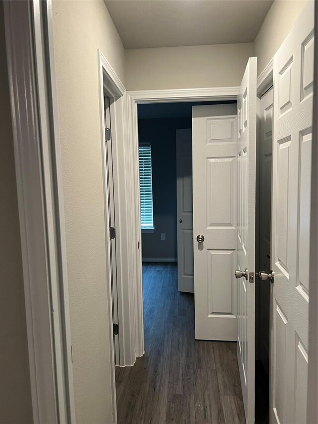 6108 Abrams Rd Unit 215, Dallas, TX 75231 - corridor featuring dark wood-style flooring