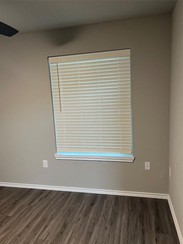 6108 Abrams Rd Unit 215, Dallas, TX 75231 - spare room with dark wood-style floors and baseboards