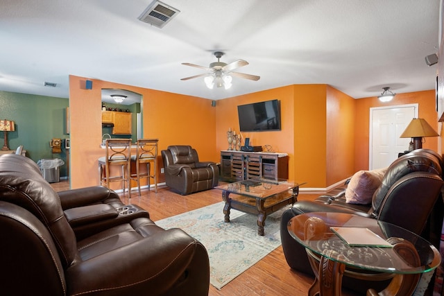 419 NW Murphy Rd, Burleson, TX 76028 - living area with a ceiling fan and wood finished floors