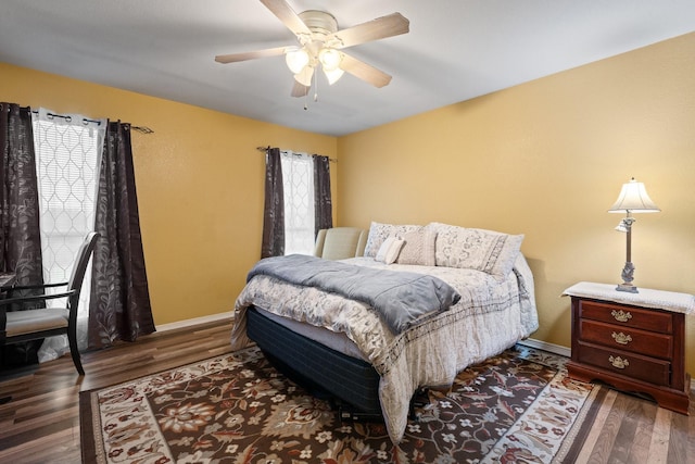 419 NW Murphy Rd, Burleson, TX 76028 - bedroom with wood finished floors and ceiling fan