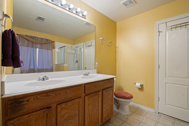 419 NW Murphy Rd, Burleson, TX 76028 - bathroom featuring double vanity, a shower stall, and tile patterned floors