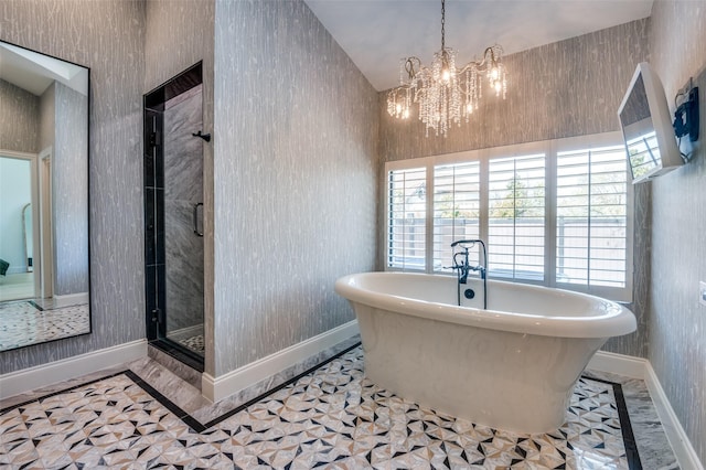 1509 Travis Cir S, Irving, TX 75038 - bathroom featuring wallpapered walls, baseboards, a freestanding tub, a chandelier, and a stall shower
