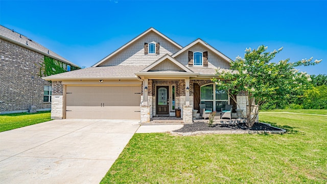 4100 Fanita Pl, Denton, TX 76210 - craftsman inspired home featuring covered porch, a front yard, an attached garage, concrete driveway, and a shingled roof