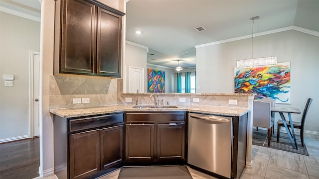 4100 Fanita Pl, Denton, TX 76210 - kitchen with stainless steel dishwasher, a sink, dark brown cabinets, a peninsula, and backsplash