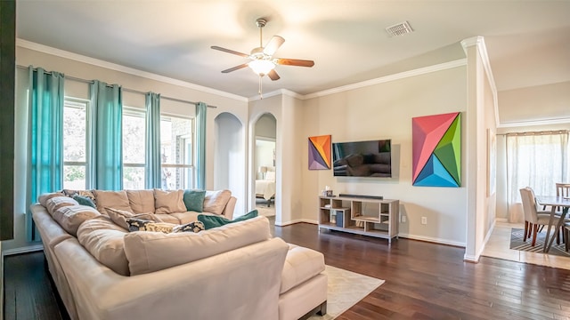 4100 Fanita Pl, Denton, TX 76210 - living area featuring arched walkways, a ceiling fan, dark wood finished floors, baseboards, and crown molding