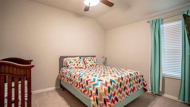 4100 Fanita Pl, Denton, TX 76210 - bedroom featuring carpet flooring, vaulted ceiling, baseboards, and ceiling fan