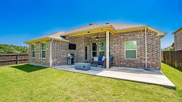 4100 Fanita Pl, Denton, TX 76210 - rear view of property featuring a ceiling fan, brick siding, a patio, an outdoor living space, and roof with shingles