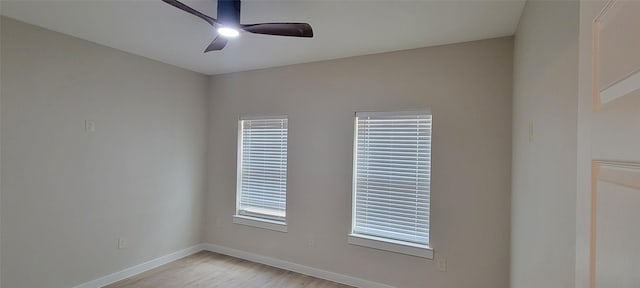 1305 Dewberry Dr, Wilmer, TX 75172 - spare room with light wood-style flooring, baseboards, and a ceiling fan