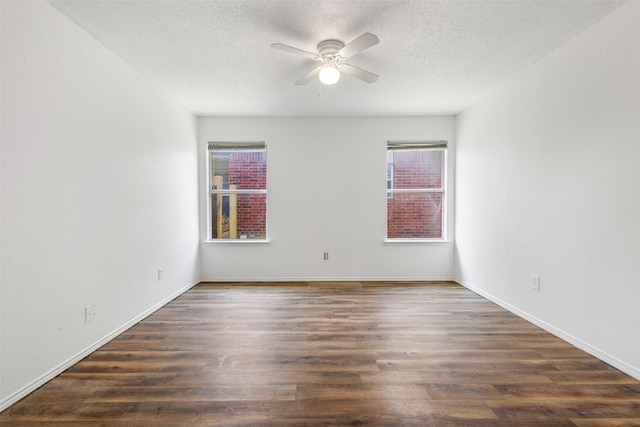 8109 Dripping Springs Dr, Fort Worth, TX 76134 - unfurnished room featuring ceiling fan, dark wood finished floors, a textured ceiling, and baseboards