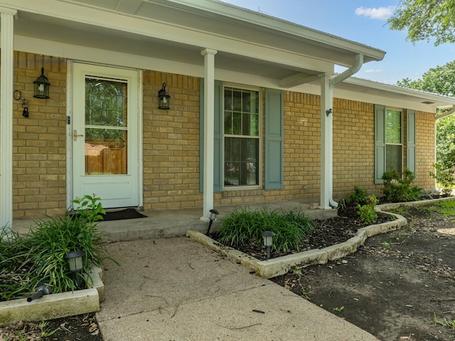 108 Mockingbird Ln, Hillsboro, TX 76645 - entrance to property with a porch and brick siding