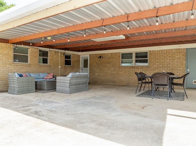 108 Mockingbird Ln, Hillsboro, TX 76645 - view of patio featuring an outdoor living space and outdoor dining area