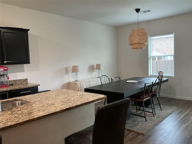 304 Gypsum Ln, Glenn Heights, TX 75154 - dining space with dark wood finished floors and baseboards