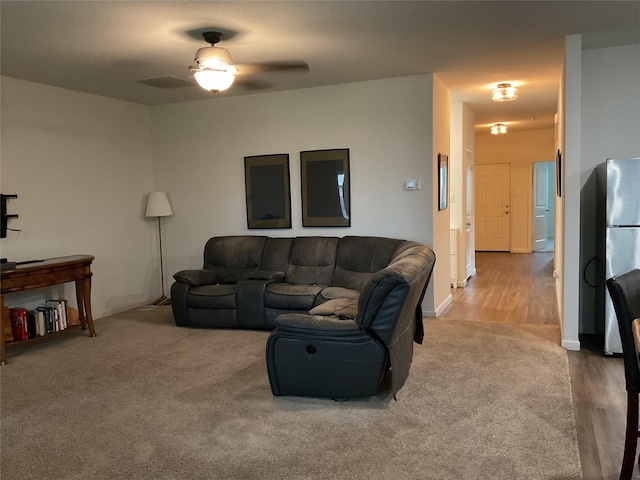 304 Gypsum Ln, Glenn Heights, TX 75154 - living area featuring carpet floors, ceiling fan, and baseboards