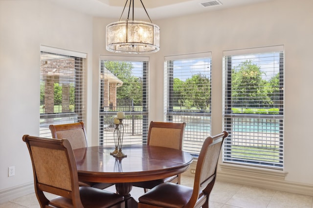 499 Savannah Hill Ln, Rockwall, TX 75032 - dining room featuring light tile patterned floors and baseboards