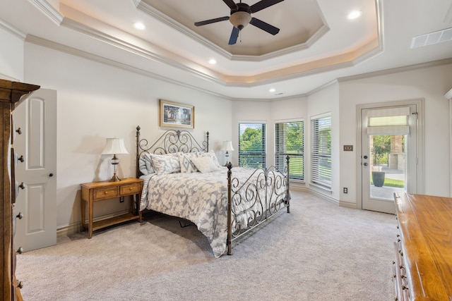 499 Savannah Hill Ln, Rockwall, TX 75032 - bedroom featuring ornamental molding, light colored carpet, access to exterior, a raised ceiling, and recessed lighting