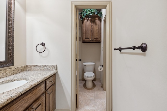499 Savannah Hill Ln, Rockwall, TX 75032 - bathroom featuring vanity, toilet, baseboards, and tile patterned floors