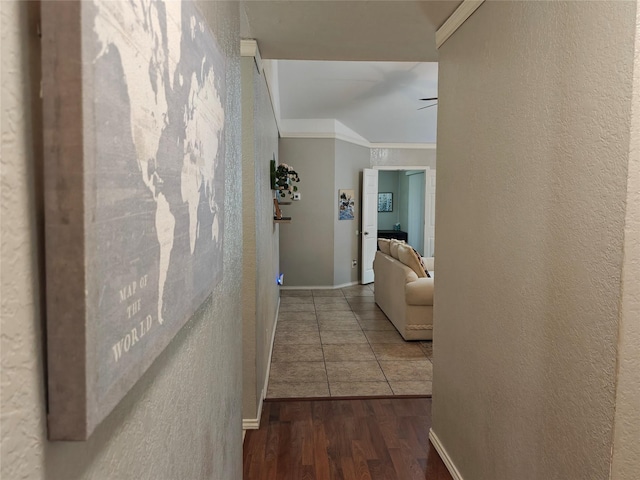 5309 San Mateo Ct, Arlington, TX 76017 - hall featuring ornamental molding, a textured wall, wood finished floors, and baseboards