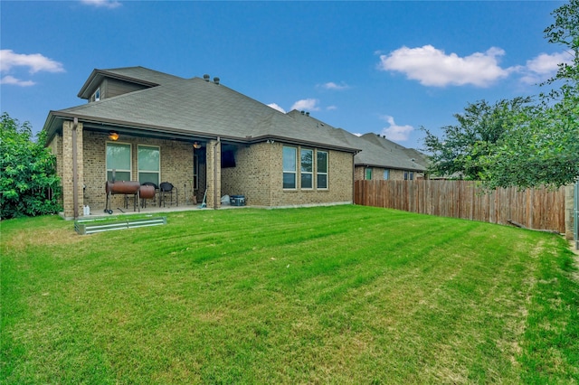 6158 Stillhouse Ln, Fort Worth, TX 76179 - back of house with a patio and brick siding