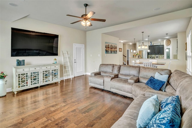 6158 Stillhouse Ln, Fort Worth, TX 76179 - living area featuring a ceiling fan, wood finished floors, and baseboards