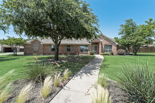 1301 Shell Beach Dr, Little Elm, TX 75068 - single story home featuring brick siding
