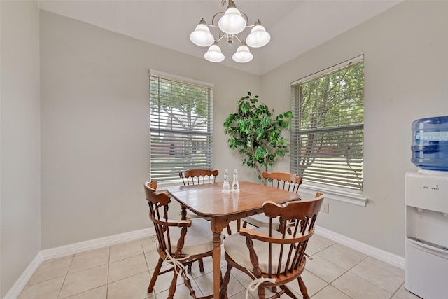 1301 Shell Beach Dr, Little Elm, TX 75068 - dining area featuring healthy amount of natural light, a chandelier, and light tile patterned floors