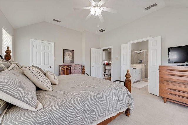 1301 Shell Beach Dr, Little Elm, TX 75068 - bedroom featuring light colored carpet, vaulted ceiling, ensuite bath, and ceiling fan